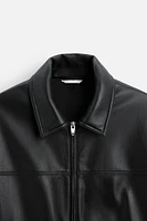 BLOUSON EN MATIÈRE SYNTHÉTIQUE