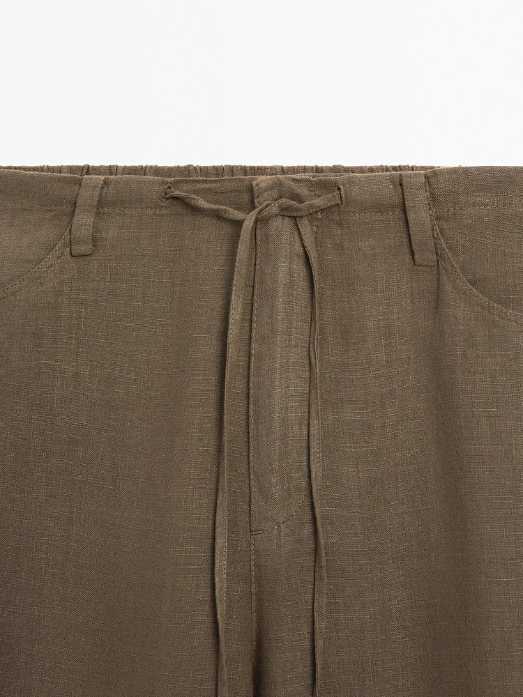 100% linen straight-leg trousers with pockets