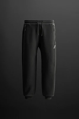 TECHNICAL ZIPPER JOGGER PANTS