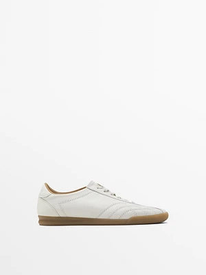 White topstitched trainers
