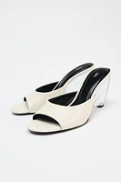 TRANSPARENT WEDGE LEATHER MULES