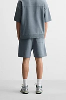 INTERLOCK STRUCTURED SHORTS
