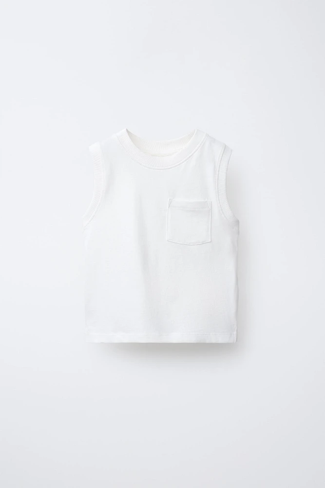 T-SHIRT POCHE SANS MANCHES