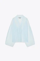 BLOUSE SEMI-TRANSPARENTE EN MAILLE