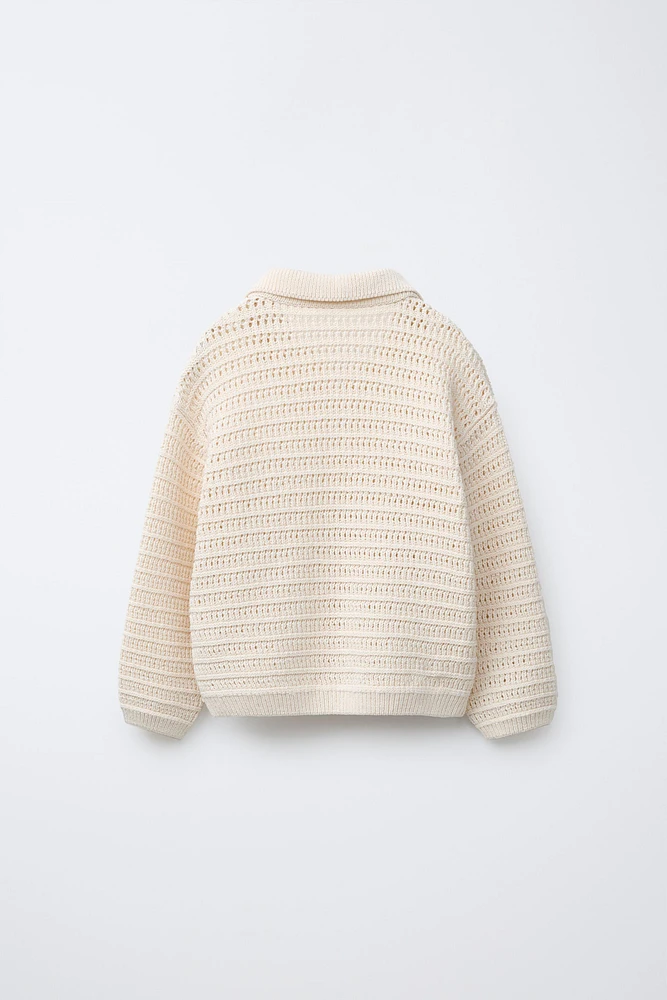 PULL EN MAILLE AJOURÉE