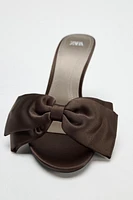 SATIN FINISH MAXI BOW HEELED SANDALS