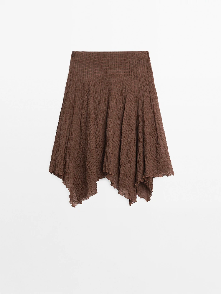 Jupe fluide à carreaux bas asymétrique