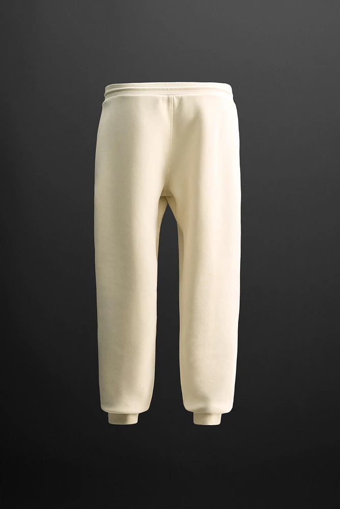 TECHNICAL ZIPPER JOGGER PANTS