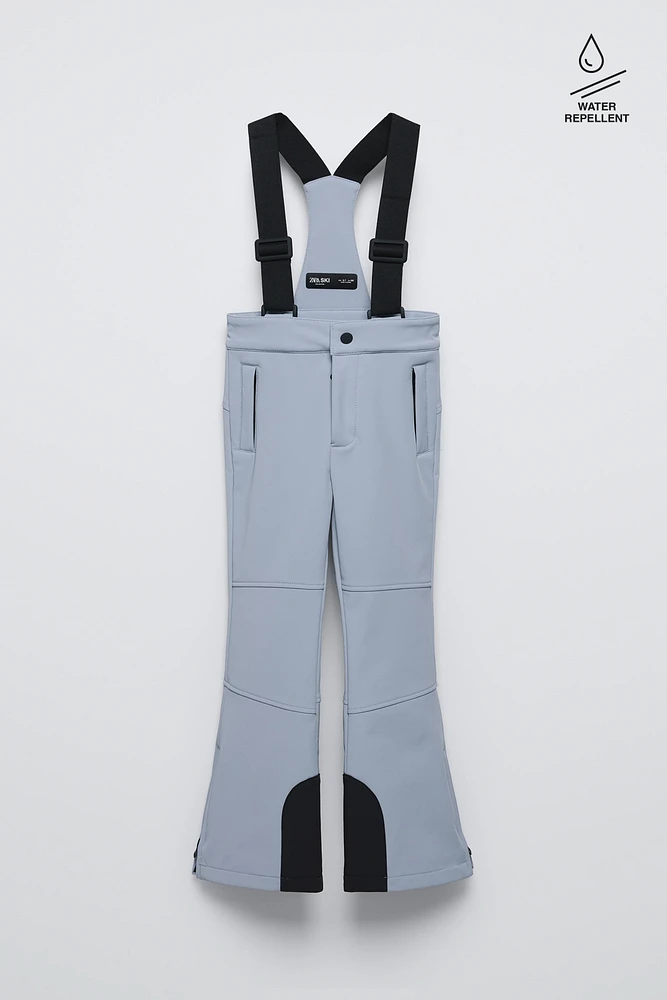 WINDPROOF AND WATER RESISTANT RECCO® SYSTEM SUSPENDER PANTS SKI COLLECTION