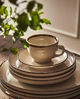 PORCELAIN TEACUP WITH ANTIQUE FINISH RIM