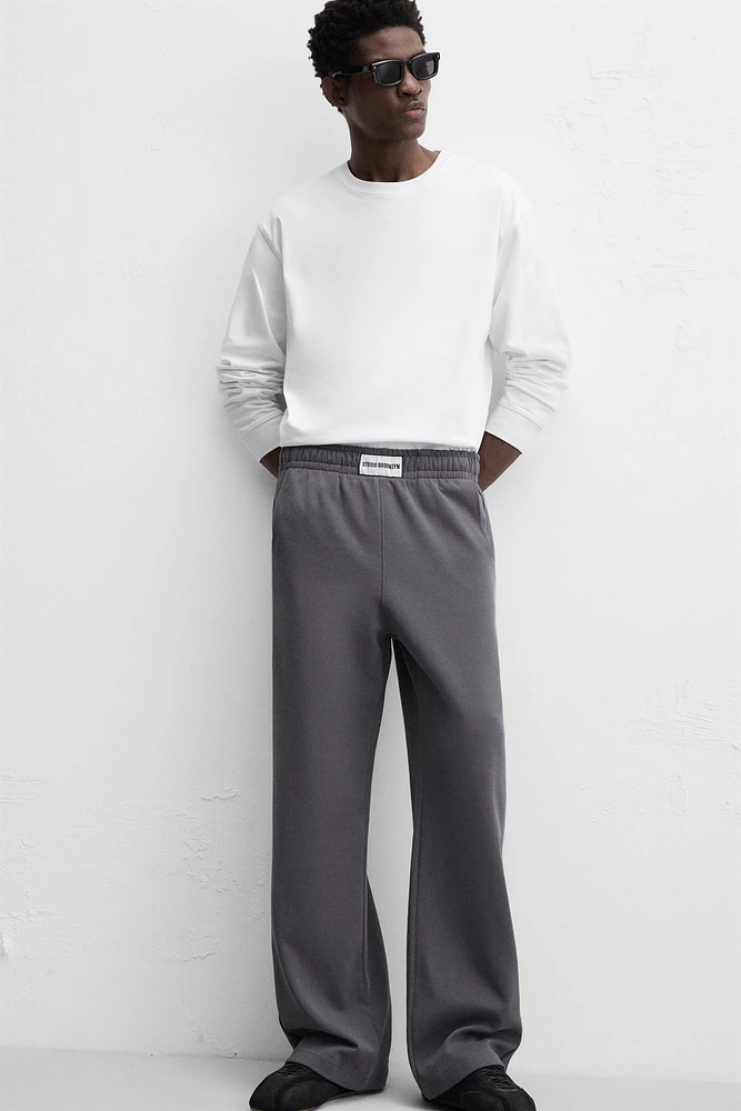 PATCH INTERLOCK PANTS