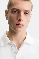 RELAXED FIT PIQUÉ POLO SHIRT
