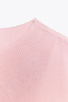 TOP EN MAILLE MANCHES AMPLES