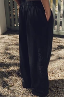 MULTI-PLEAT EMBROIDERED PANTS