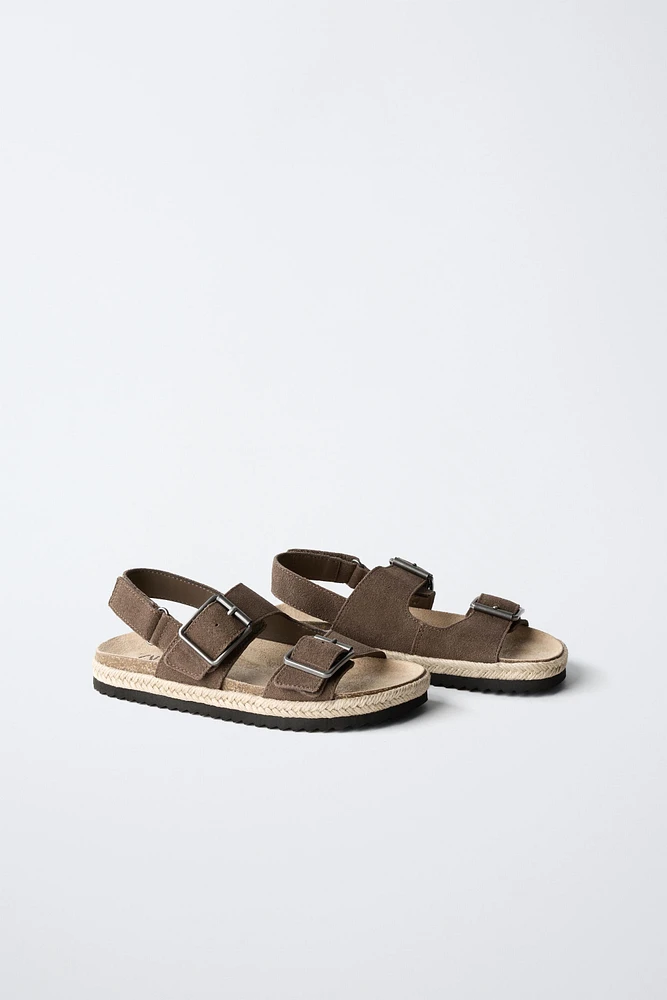 SANDALES EN CUIR À BOUCLES ET JUTE