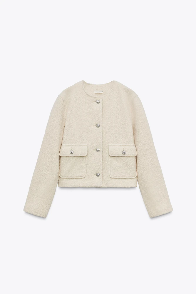 VESTE BOUCLÉ À BOUTONS