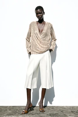 BLOUSE CROISÉE SEQUINS