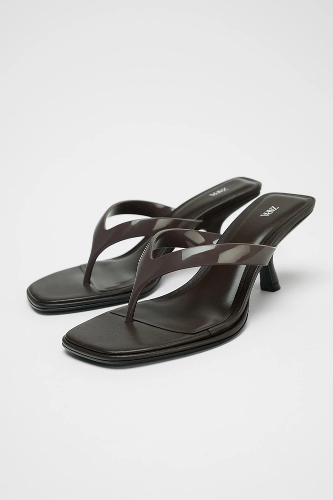 ASYMMETRIC HEELED SANDALS