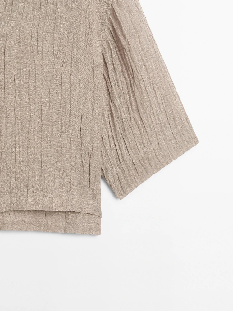 Blouse fluide col ouvert en lin mélangé