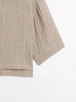 Blouse fluide col ouvert en lin mélangé