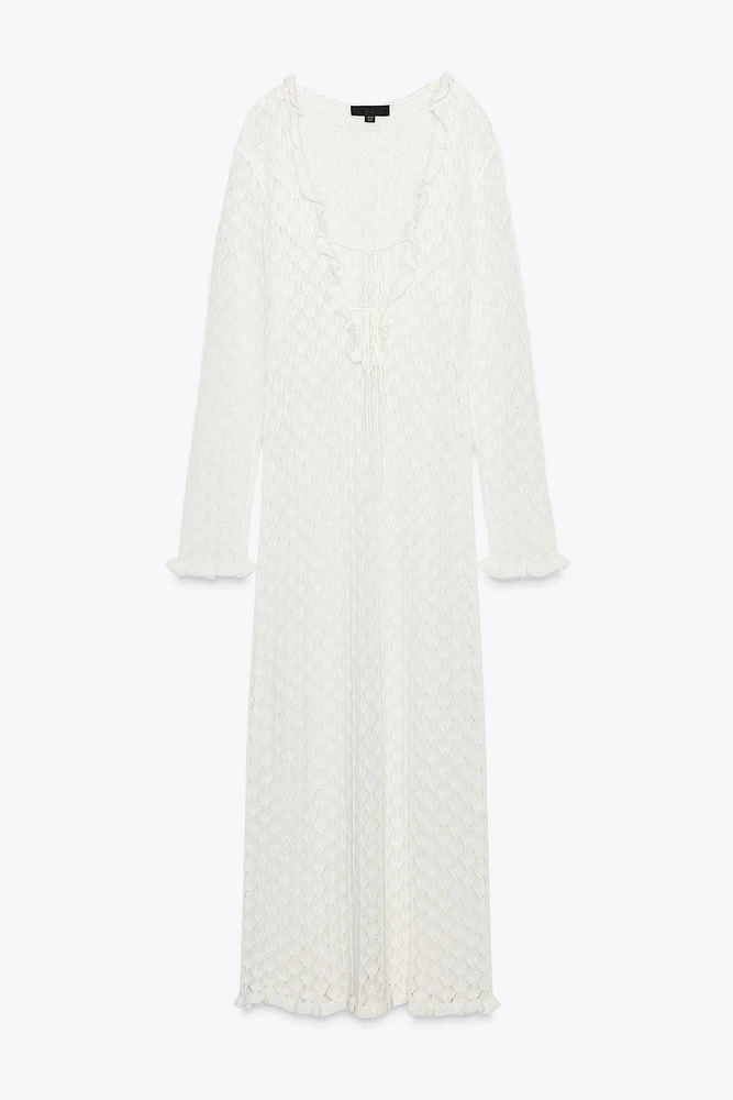 ROBE LONGUE EN MAILLE POINTELLE À VOLANTS