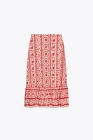 JUPE MIDI BRODERIES PERFORÉES
