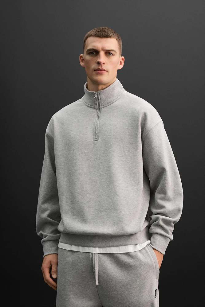 ZIP MOCK NECK SWEATSHIRT