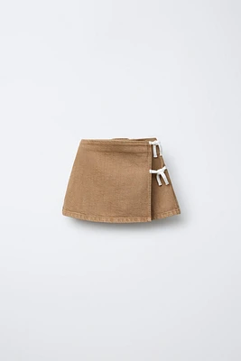 SERGED SKIRT WITH TIES