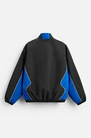 BLOUSON TECHNIQUE AVEC BLOCS DE COULEUR