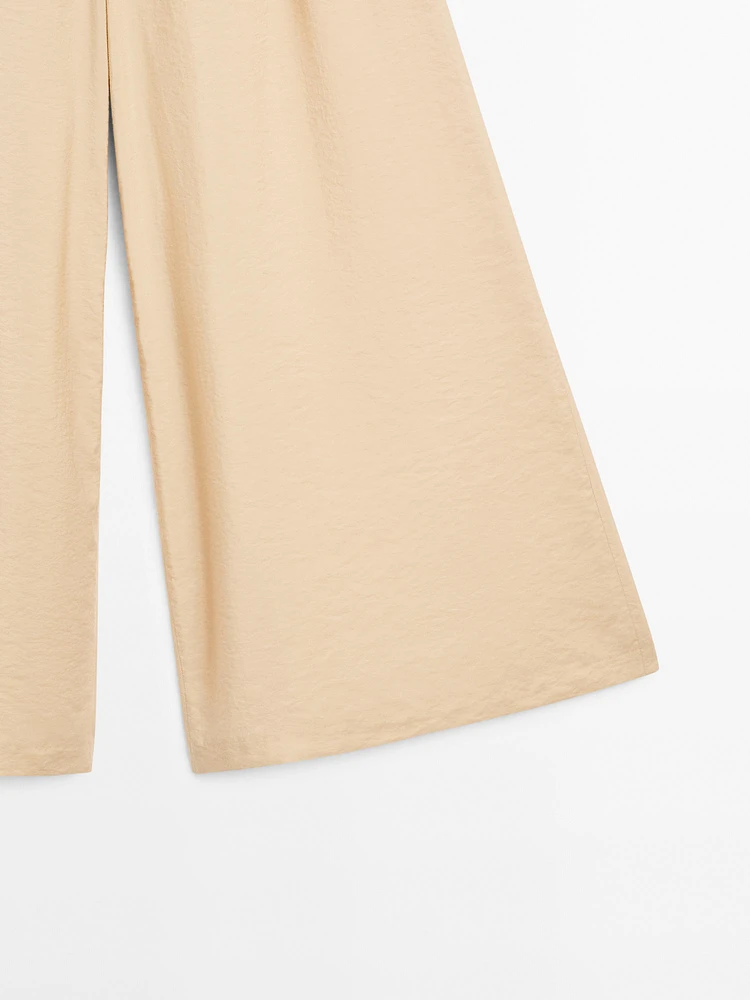 Pantalon palazzo à pinces