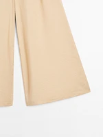 Pantalon palazzo à pinces