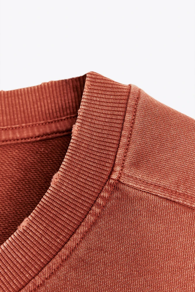 WASHED EFFECT PLUSH SWEATSHIRT