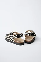 SANDALES EN CUIR ANIMAL PRINT