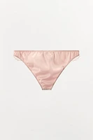 CULOTTE EN MATIÈRES VARIÉES BRODÉES