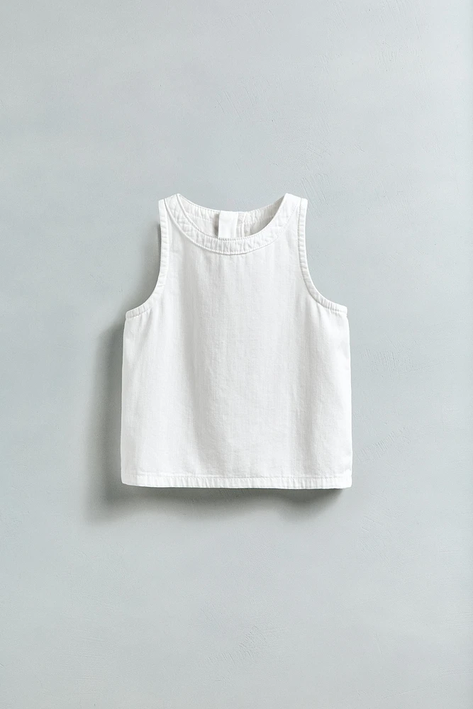 TOP SANS MANCHES ZIP