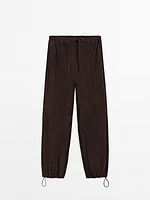 Pantalon parachute en cuir et daim