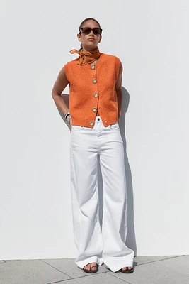TOP GILET EN MAILLE BOUTON COQUILLAGE