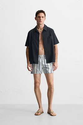 STRIPED REGULAR SWIMMING TRUNKS