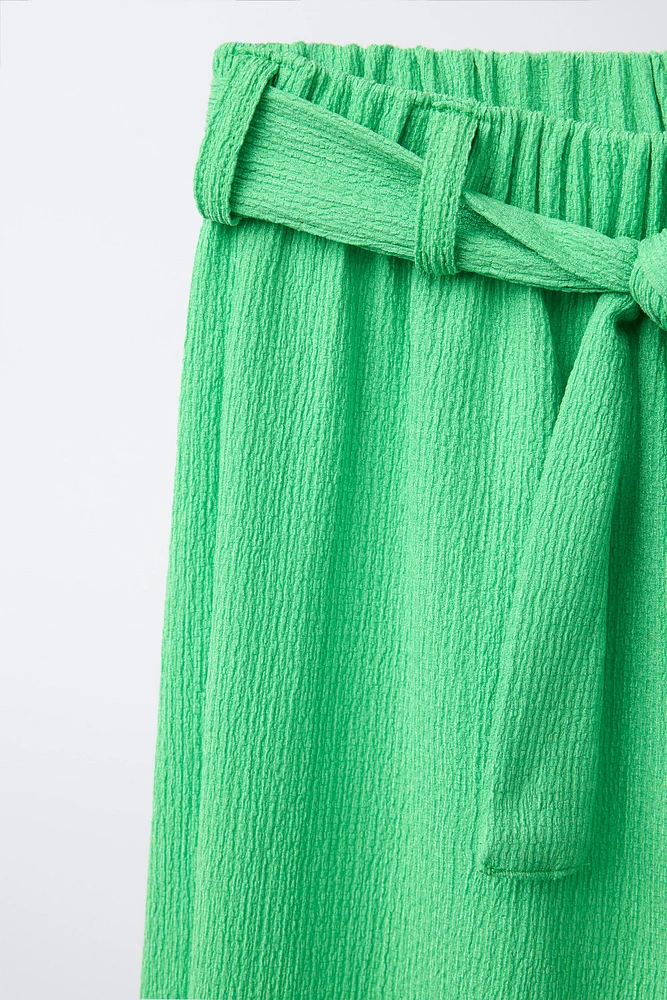 TEXTURED BELTED PANTS