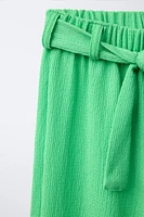 TEXTURED BELTED PANTS