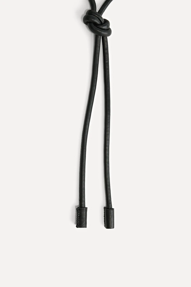 CIRCULAR LEATHER BELT 50TH ANNIVERSARY