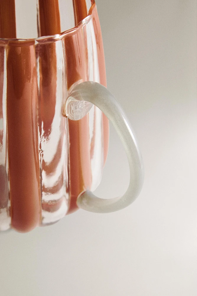 GLASS PITCHER WITH STRIPED HANDLE AND CONTRAST