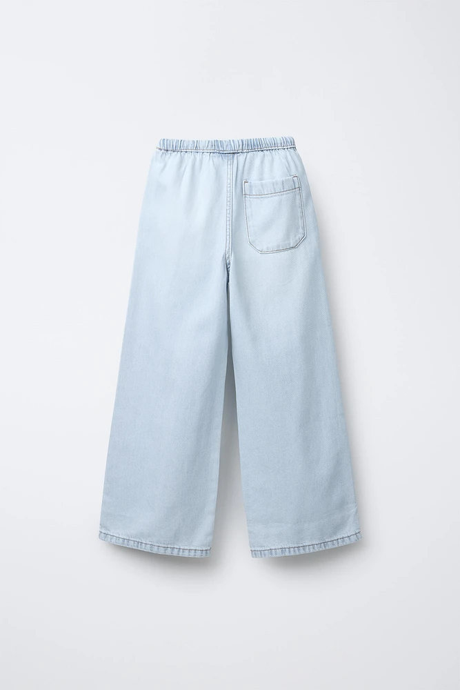 JEAN LARGE À TAILLE FINE