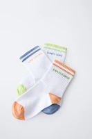 LOT DE TROIS PAIRES CHAUSSETTES RAYURES ET INSCRIPTION