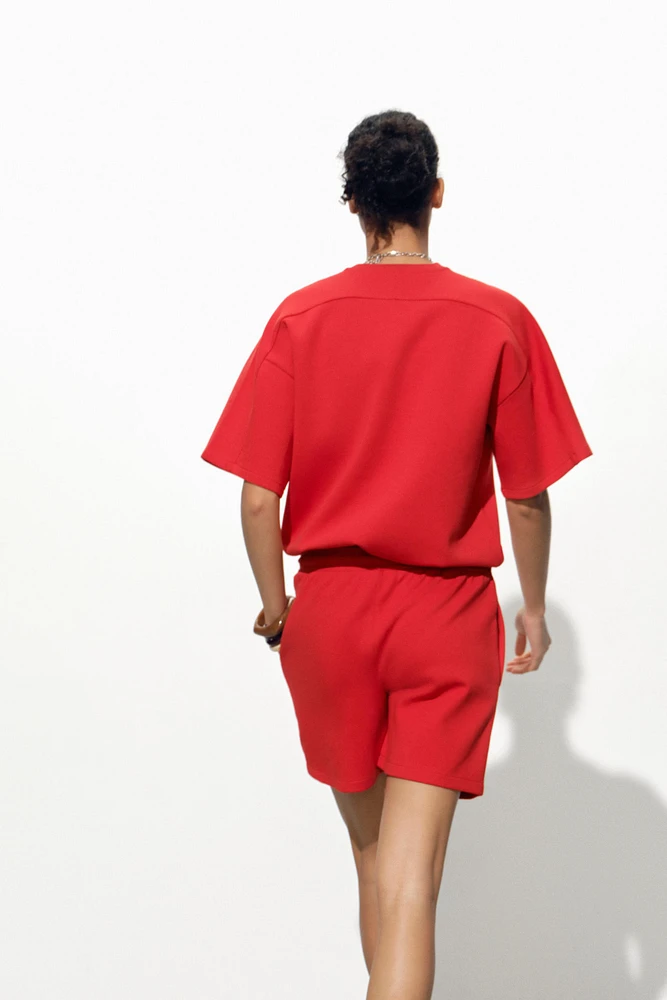 SHORT SLEEVE INTERLOCK SWEATSHIRT