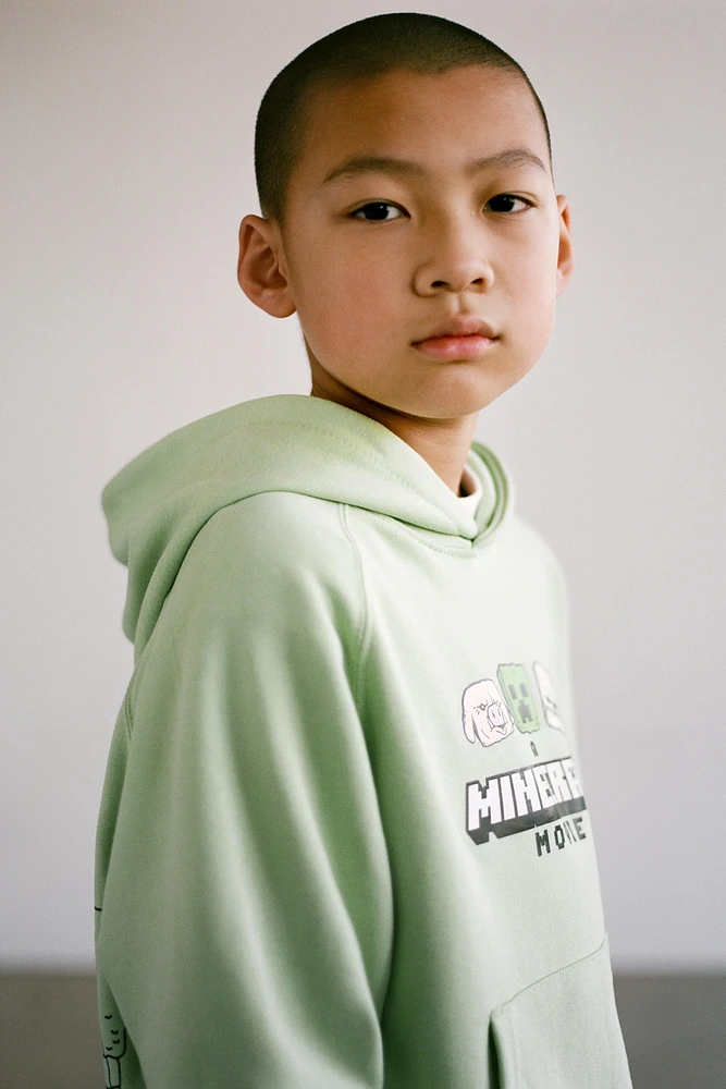 SWEAT À CAPUCHE MINECRAFT © MOJANG AB. ™