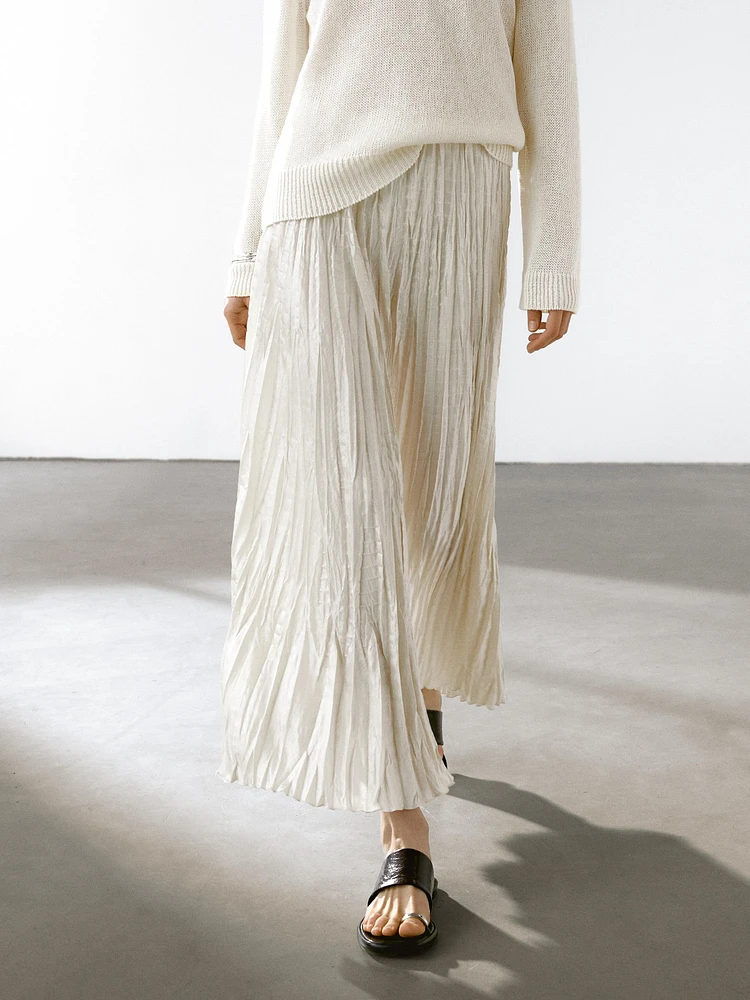 Flowing midi skirt with box pleats