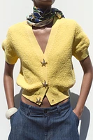 GILET EN MAILLE BOUTON ÉTOILE