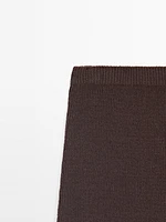 Long knit skirt with fringed hem