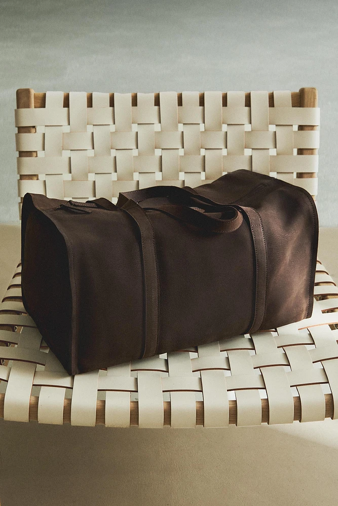 FADED LEATHER TRAVEL BAG